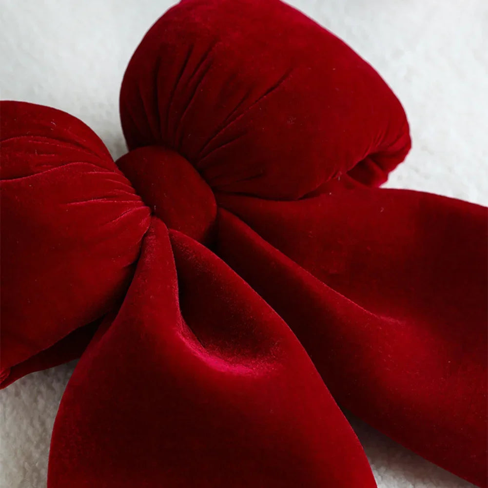 Festive decoration: red velvet bow for Christmas