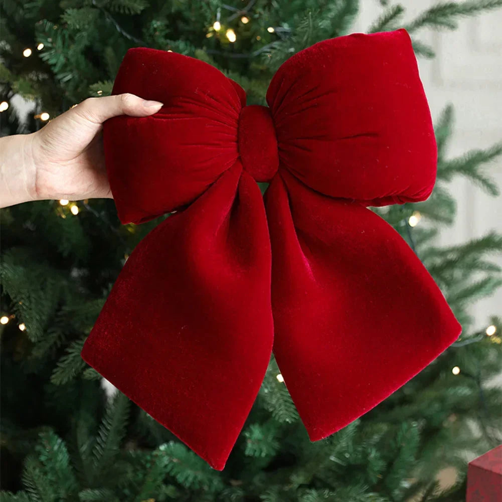 Festive decoration: red velvet bow for Christmas