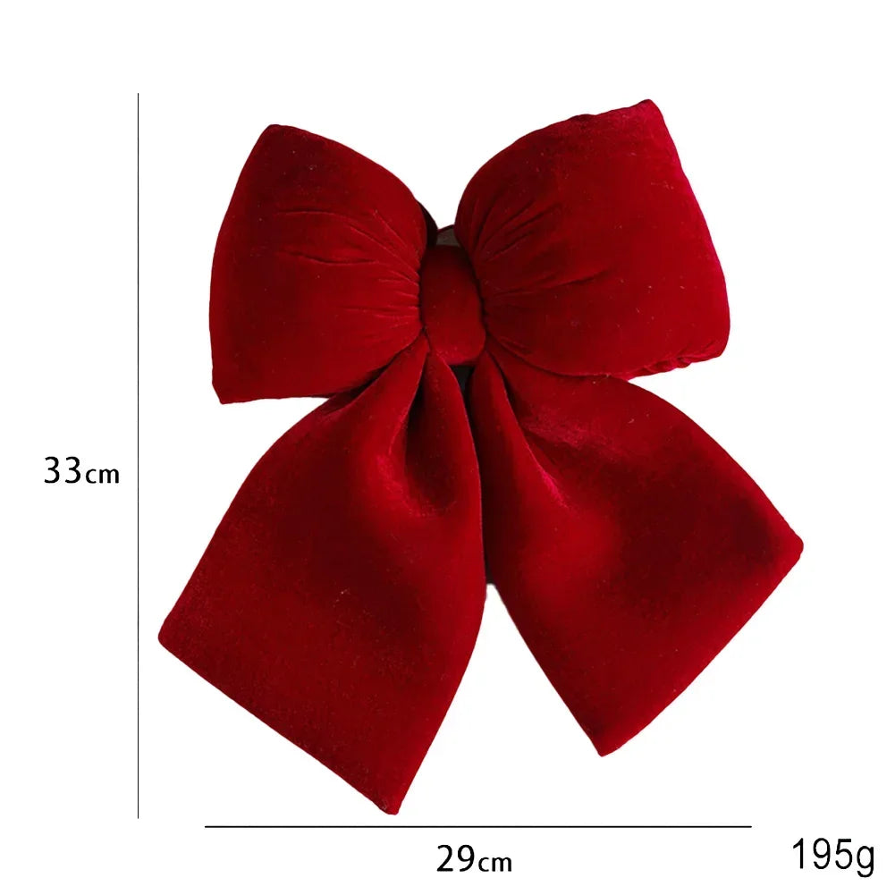 Festive decoration: red velvet bow for Christmas